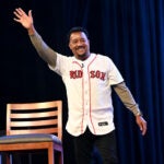 Former Red Sox pitcher Pedro Martinez makes his entrance for a panel discussion on the 2004 World Series championship during the Red Sox Winter Weekend at MassMutual Center in Springfield.