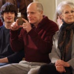 Spike Fearn, Woody Harrelson, who pretends to take pictures with his hands of the audience attending the event, and Jamie Lee Curtis.