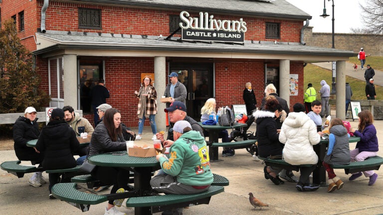Dozens of customers sit outside of Sullivan's Castle Island.