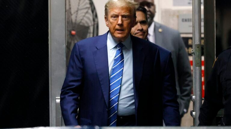 Former US President Donald Trump returns to the courtroom after a short recess in the second day of his trial for allegedly covering up hush money payments linked to extramarital affairs, at the Manhattan Criminal Court in New York City on April 16, 2024.