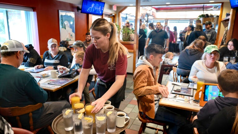 Waitress Rachel Gurcik serves customers at the Gateway Diner in Westville, Pa.