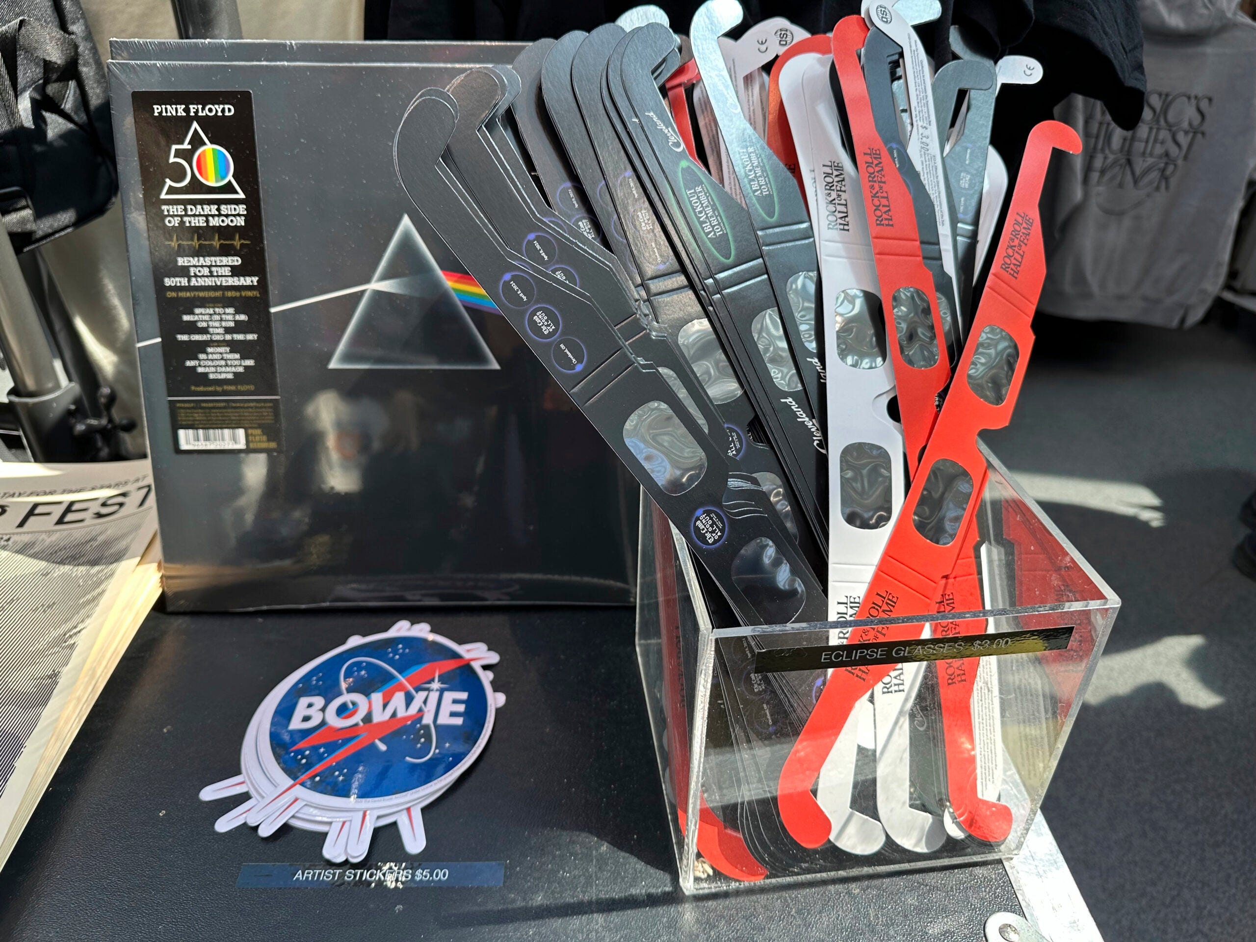 Eclipse glasses are for sale along with Pink Floyd's "Dark Side of the Moon," album at the Rock & Roll Hall of Fame in Cleveland.