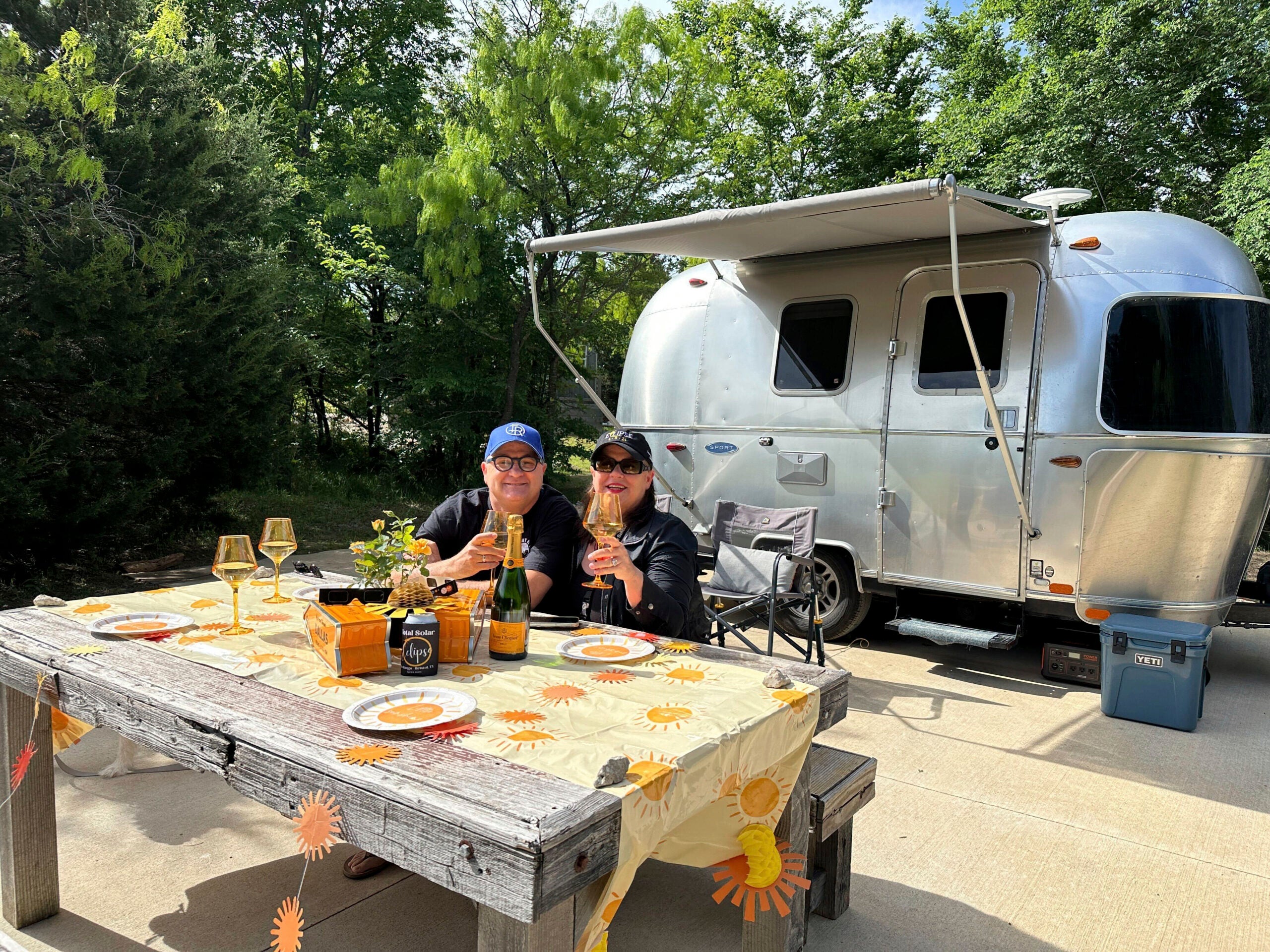 Jeff Pappas and his wife, Maribeth Messineo Pappas, pose by their Airstream trailer at the Range Vintage Trailer Resort near Ennis, Texas.