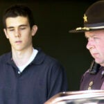 In this Dec. 7, 2001 file photo, James Parker is brought into court in Haverhill, N.H.