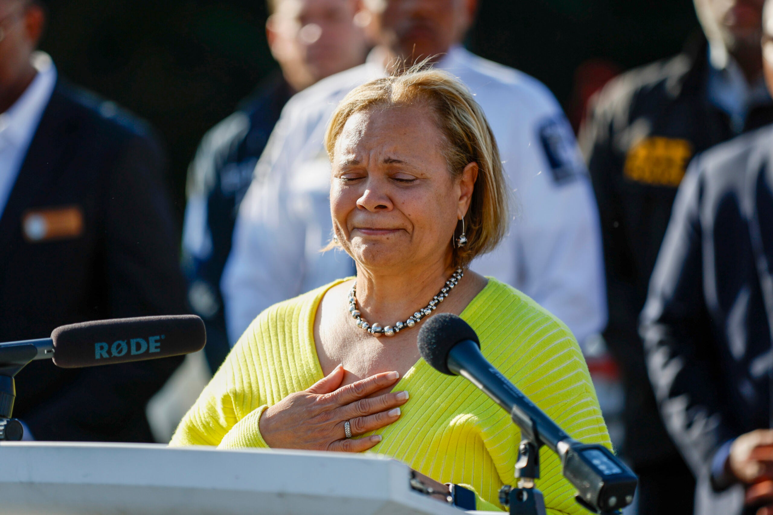 Charlotte Mayor Vi Lyles gets choked up as she speaks at a press conference. 