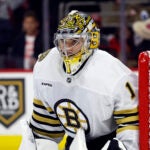 Boston Bruins goaltender Jeremy Swayman (1) watches the puck against the Carolina Hurricanes during the second period of an NHL hockey game in Raleigh, N.C., Thursday, April 4, 2024.