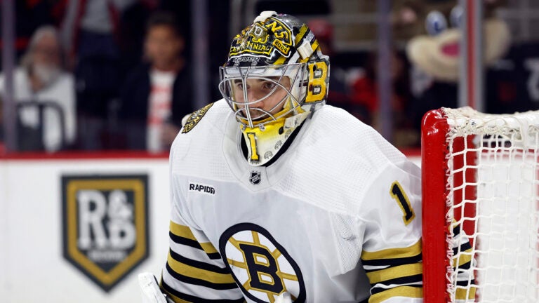 Boston Bruins goaltender Jeremy Swayman (1) watches the puck against the Carolina Hurricanes during the second period of an NHL hockey game in Raleigh, N.C., Thursday, April 4, 2024.