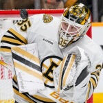 Bruins goaltender Linus Ullmark blocks a shot on goal during the second period.
