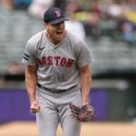 Nick Pivetta #37 of the Boston Red Sox reacts after the Oakland Athletics hit into a double play with the bases loaded to end the fifth inning
