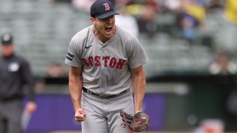 Nick Pivetta #37 of the Boston Red Sox reacts after the Oakland Athletics hit into a double play with the bases loaded to end the fifth inning