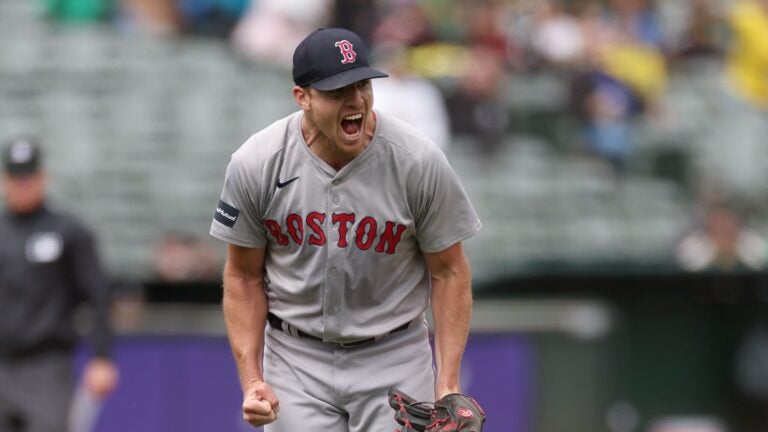 OAKLAND, CALIFORNIA - APRIL 03: Nick Pivetta #37 of the Boston Red Sox reacts after the Oakland Athletics hit into a double play with the bases loaded to end the fifth inning at Oakland Coliseum on April 3, 2024 in Oakland, California.