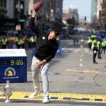 Grand marshal Rob Gronkowski spiked a football at the finish line and the party was on for the Boston Marathon.