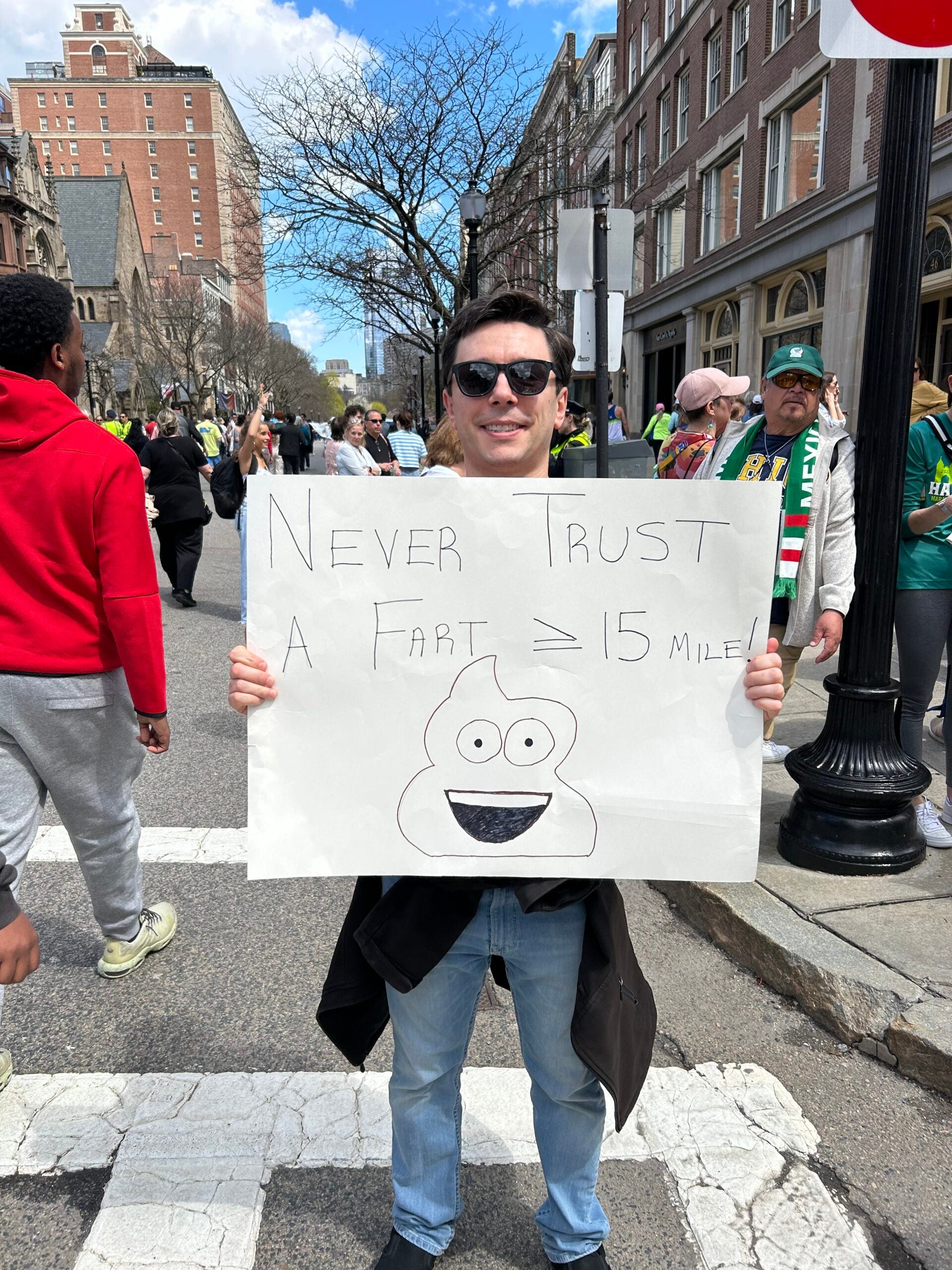 The best signs spotted along the 128th Boston Marathon route