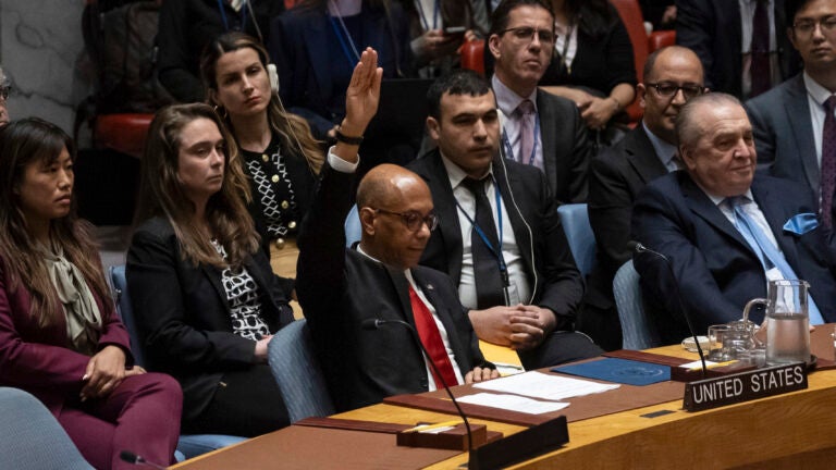 U.S. Deputy Ambassador Robert Wood votes against resolution during a Security Council meeting at United Nations headquarters, Thursday, April 18, 2024.