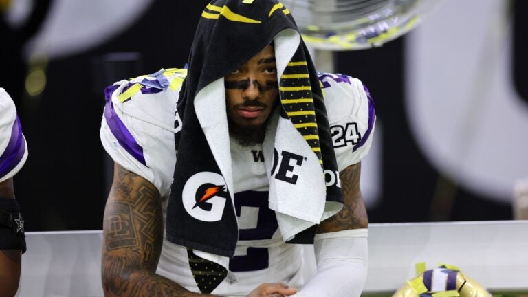 HOUSTON, TEXAS - JANUARY 08: Ja'Lynn Polk #2 of the Washington Huskies reacts after being defeated by the Michigan Wolverines during the 2024 CFP National Championship game at NRG Stadium on January 08, 2024 in Houston, Texas. Michigan defeated Washington 34-13.