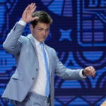 North Carolina quarterback Drake Maye walks on stage during the first round of the NFL football draft, Thursday, April 25, 2024, in Detroit.
