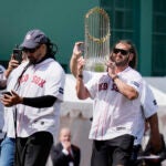 Members of the 2004 Boston Red Sox World Series championship team, Johnny Damon, right, Manny Ramirez, center, and Mike Timlin take the field during ceremonies before an opening day baseball game at Fenway Park against the Baltimore Orioles, Tuesday, April 9, 2024, in Boston.