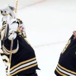 Boston Bruins' Linus Ullmark, left, and Jeremy Swayman celebrate after defeating the Pittsburgh Penguins during an NHL hockey game, Saturday, March 9, 2024, in Boston.