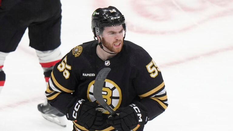 Boston Bruins right wing Justin Brazeau (55) celebrates after scoring in the second period of an NHL hockey game against the Ottawa Senators, Tuesday, March 19, 2024, in Boston.