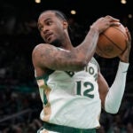 Boston Celtics forward Oshae Brissett (12) during an NBA basketball game, Sunday, April 7, 2024, in Boston.