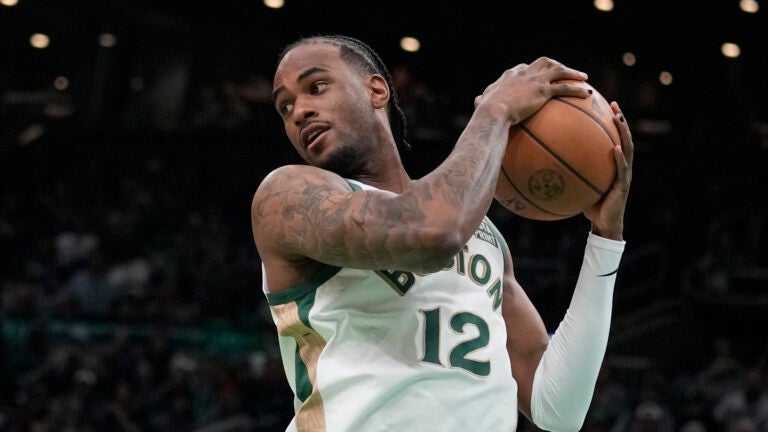 Boston Celtics forward Oshae Brissett (12) during an NBA basketball game, Sunday, April 7, 2024, in Boston.