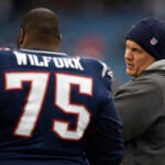 Patriots head coach Bill Belichick talks to nose tackle Vince Wilfork during pre- game action at Gillette Stadium on Sunday December 13, 2009.