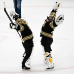 Boston Bruins goaltender Jeremy Swayman (1) celebrates with teammate goaltender Linus Ullmark (35) after they defeated the Toronto Maple Leafs 5-1 during NHL Playoff action at TD Garden.