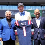 The New England Patriots introduced their new number 1 draft choice, qb Drake Maye to the media on the field at Gillette Stadium. He was escorted on to the field by Robert and Jonathan Kraft(rt) who presented him with his jersey.
