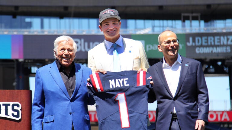 The New England Patriots introduced their new number 1 draft choice, qb Drake Maye to the media on the field at Gillette Stadium. He was escorted on to the field by Robert and Jonathan Kraft(rt) who presented him with his jersey.