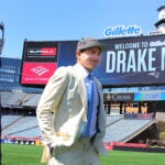 New England Patriots introduced their new number 1 draft choice, qb Drake Maye to the media on the field at Gillette Stadium. He was escorted on to the field by Robert and Jonathan Kraft.
