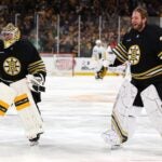 BOSTON, MASSACHUSETTS - MAY 04: Jeremy Swayman #1 and Linus Ullmark #35 of the Boston Bruins celebrate after defeating the Toronto Maple Leafs in overtime tow win Game Seven of the First Round of the 2024 Stanley Cup Playoffs at TD Garden on May 04, 2024 in Boston, Massachusetts.