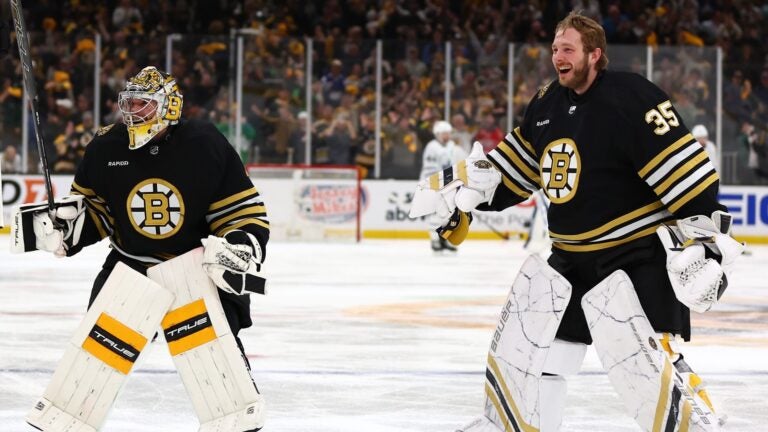 BOSTON, MASSACHUSETTS - MAY 04: Jeremy Swayman #1 and Linus Ullmark #35 of the Boston Bruins celebrate after defeating the Toronto Maple Leafs in overtime tow win Game Seven of the First Round of the 2024 Stanley Cup Playoffs at TD Garden on May 04, 2024 in Boston, Massachusetts.