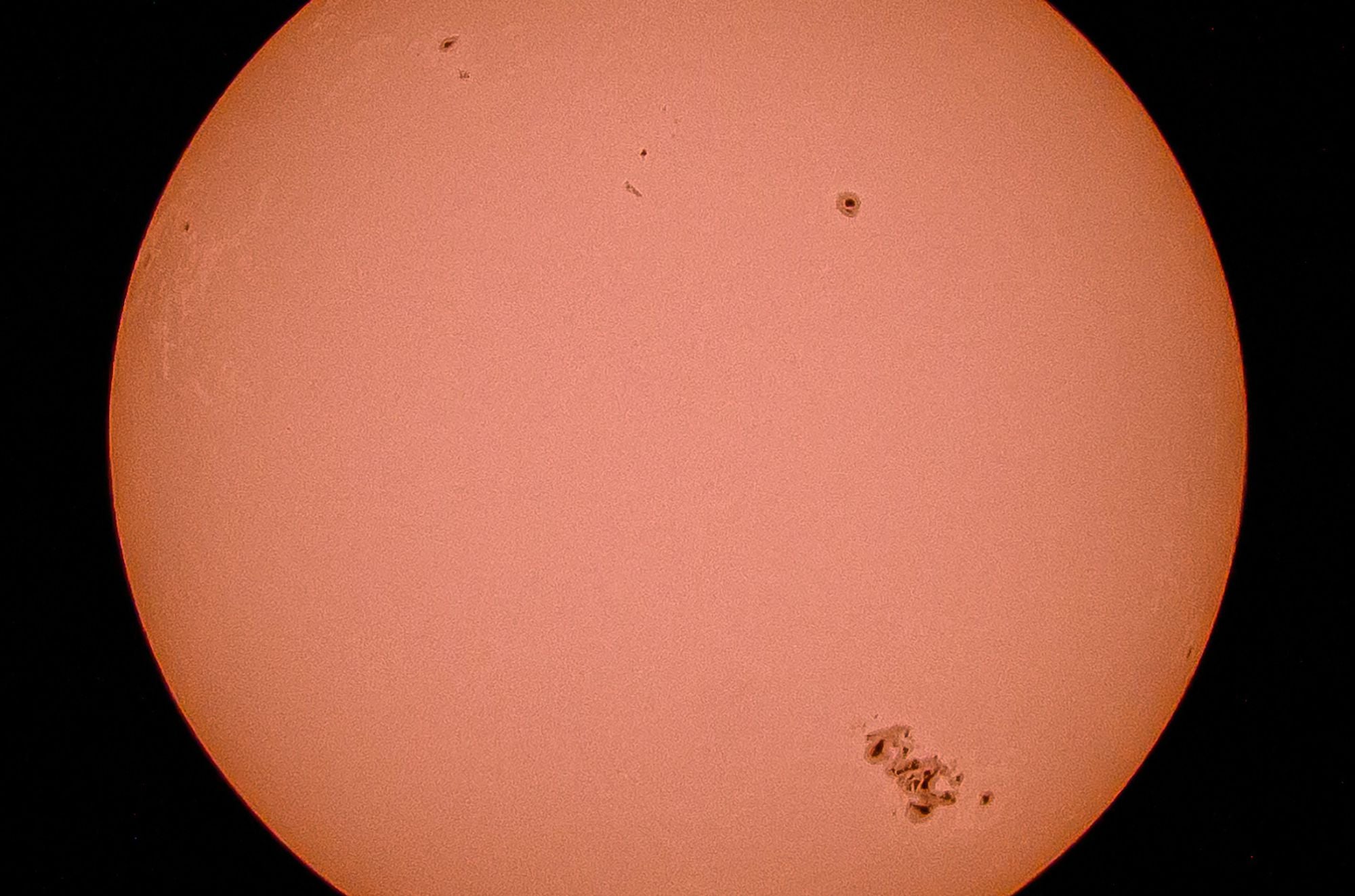 Sunspot R3664 is seen on the lower right section of the sun in this photograph taken with a solar filter in Novato, California. 