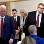 David Meehan sits in court as his attorneys Rus Rilee, left, and David Vicinanzo, right, along with state's attorneys Martha Gaythwaite and Brandon Chase return to the seats after a bench hearing.