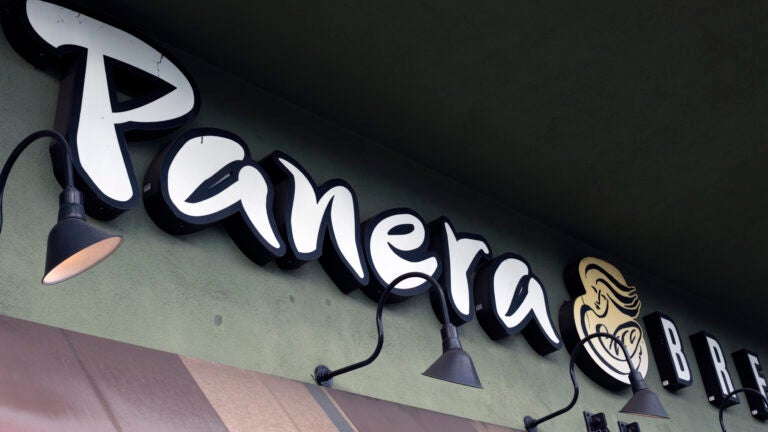 A Panera Bread sign and logo is attached to the outside of a Panera Bread restaurant location in the Studio City section of Los Angeles.