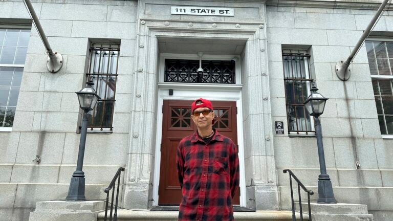 Ivo Skoric stands outside the Vermont Supreme Court building in Montpelier, Vt.