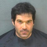 FILE - This undated inmate photo provided by the Blue Ridge Regional Jail Authority shows Estes Carter Thompson III. The American Airlines flight attendant pleaded not guilty Monday, May 20, 2024, on charges of trying to secretly video record a 14-year-old female passenger using an airplane bathroom last September.