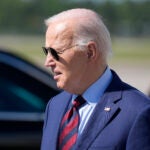 President Joe Biden walks after arriving on Air Force One at Wilmington International Airport, Thursday, May 2, 2024, in Wilmington, N.C.