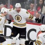 Boston Bruins right wing Justin Brazeau (55) celebrates his goal with left wing James van Riemsdyk (21) and center Trent Frederic (11) during the third period of Game 1 of the second-round series of the Stanley Cup Playoffs against the Florida Panthers, Monday, May 6, 2024, in Sunrise, Fla.
