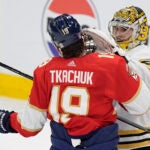 Florida Panthers left wing Matthew Tkachuk (19) and Boston Bruins goaltender Jeremy Swayman scuffle during the second period of Game 1 of the second-round series of the Stanley Cup Playoffs, Monday, May 6, 2024, in Sunrise, Fla.