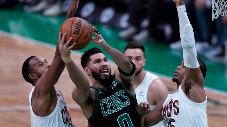 Celtics forward Jayson Tatum drives to the basket against the Cleveland Cavaliers during the first half of Game 5 in Boston.