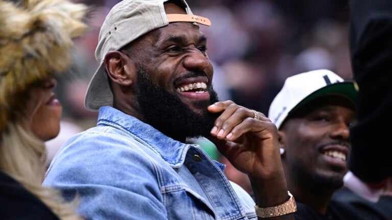 LeBron James smiles during the first half of Game 4 between the Cleveland Cavaliers and Boston Celtics in Cleveland.