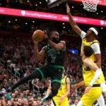 Jaylen Brown of the Celtics drives to the basket against Myles Turner of the Indiana Pacers during the third quarter of Game Two of the Eastern Conference Finals.