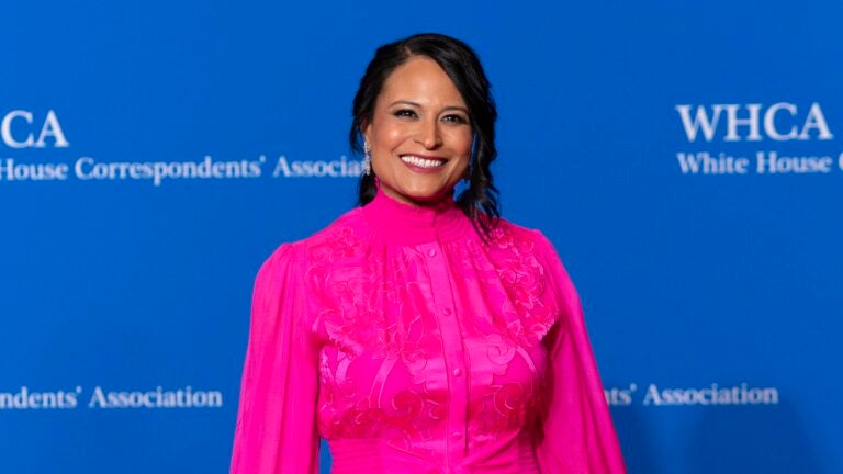NBC News anchor Kristen Welker poses for photographers as she arrives at the annual White House Correspondents' Association Dinner in Washington.