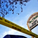 FILE - Crime scene tape surrounds Schemengees Bar & Grille, Oct. 29, 2023, in Lewiston, Maine.