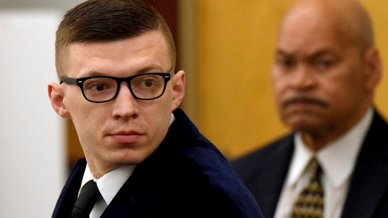 Volodymyr Zhukovskyy looks back at the gallery before closing statements started at his trial at Coos County Superior Court in Lancaster, N.H., on Tuesday, Aug. 9, 2022.