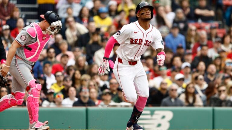 Ceddanne Rafaela of the Red Sox watches his hit go for a two-run double during the second inning.