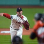 Boston Red Sox pitcher Garrett Whitlock delivers during the first inning of the team's baseball game against the Baltimore Orioles, Thursday, April 11, 2024, in Boston.