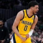 Indiana Pacers guard Tyrese Haliburton (0) reacts during the fourth quarter of Game 1 of the NBA Eastern Conference basketball finals against the Boston Celtics, Tuesday, May 21, 2024, in Boston.