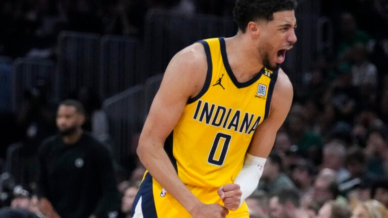 Indiana Pacers guard Tyrese Haliburton (0) reacts during the fourth quarter of Game 1 of the NBA Eastern Conference basketball finals against the Boston Celtics, Tuesday, May 21, 2024, in Boston.